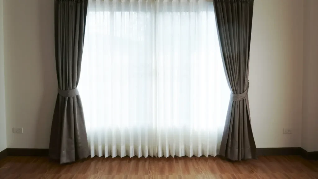 Top Curtain Trends and Complete Window Solutions for Homes and Offices in Abu Dhabi 2026 2 Premium curtains and window solutions in a luxury Abu Dhabi home, highlighting modern trends-vivid curtains