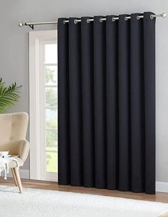 Fabric blackout curtains in Abu Dhabi for homes and offices, combining style, light control, and privacy