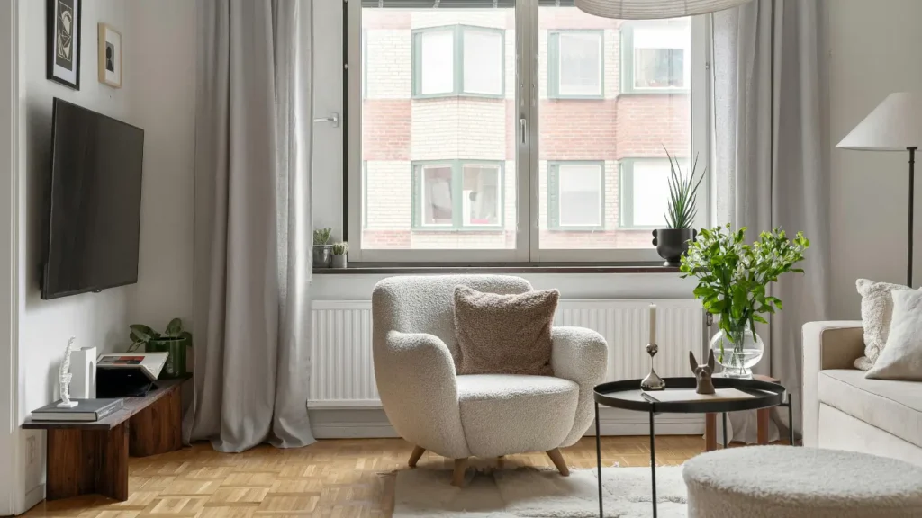 Top Curtain Trends and Complete Window Solutions for Homes and Offices in Abu Dhabi 2026 1 Stylish modern curtains in a living room in Abu Dhabi, showcasing the latest 2026 trends.-vivid curtains