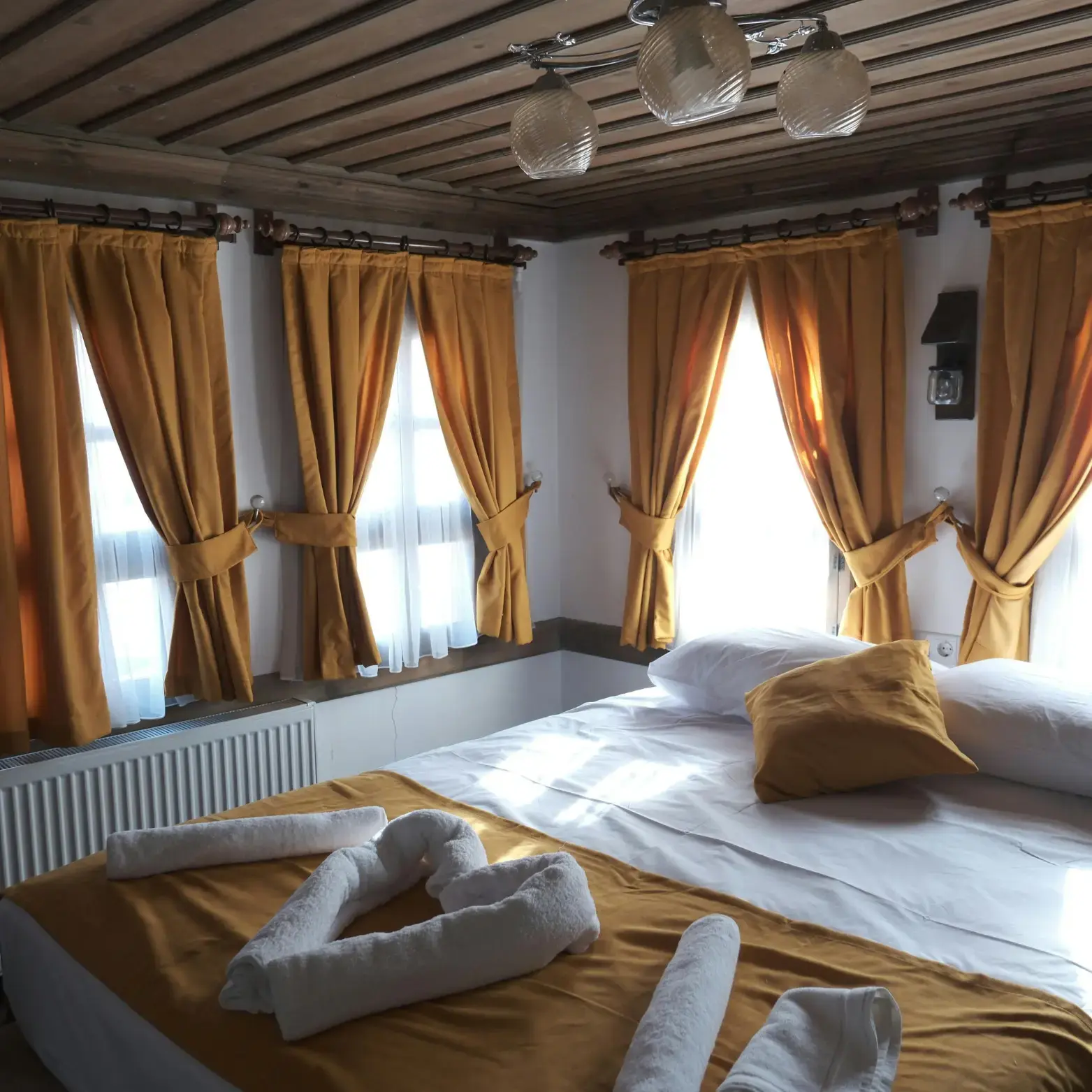 Premium accessories for American style curtains in Abu Dhabi, including decorative rods, rings, hooks, and tiebacks to enhance your curtain setup.