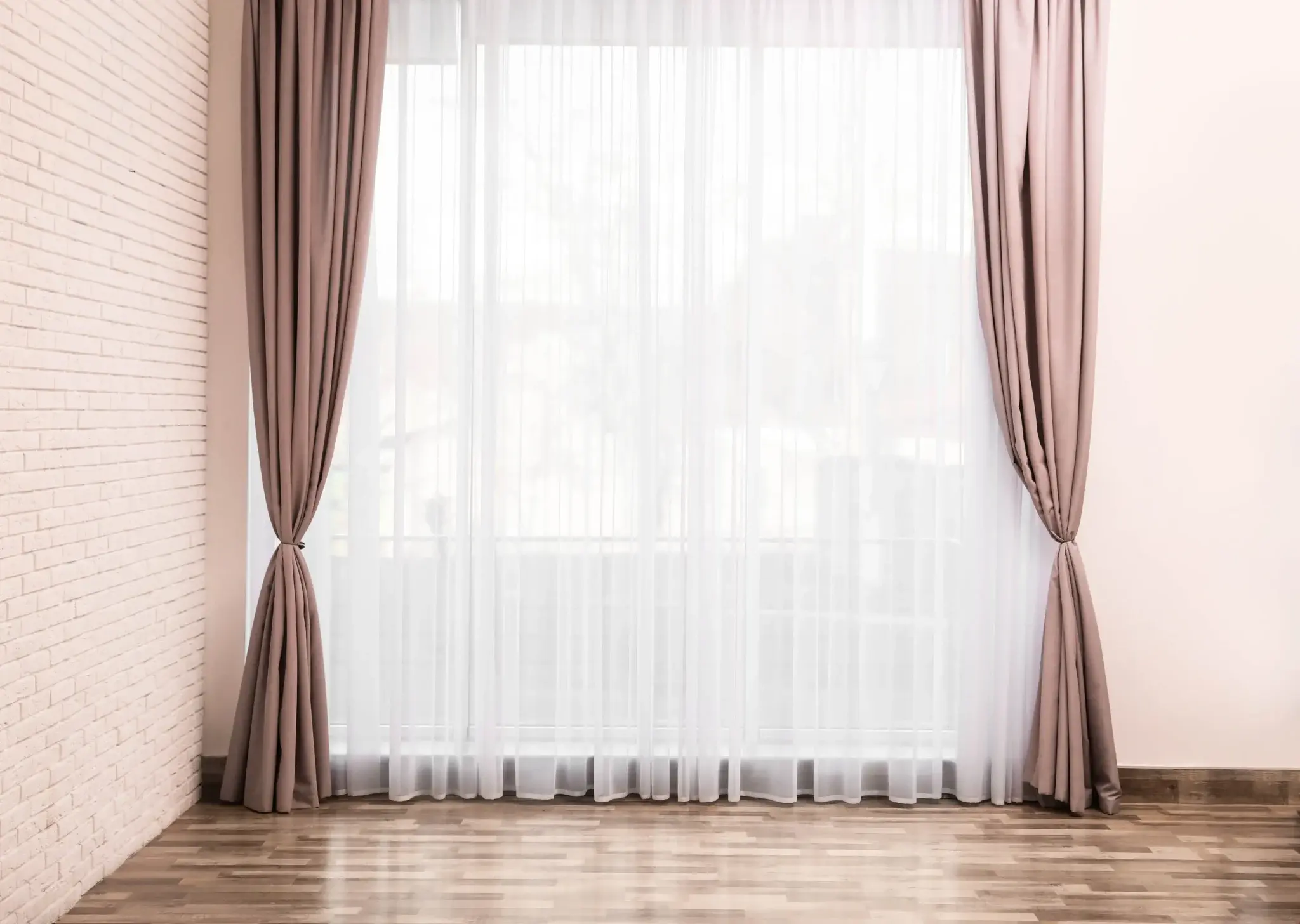 Elegant American style curtains installed in a modern Abu Dhabi home featuring premium fabric and stylish interior design.
