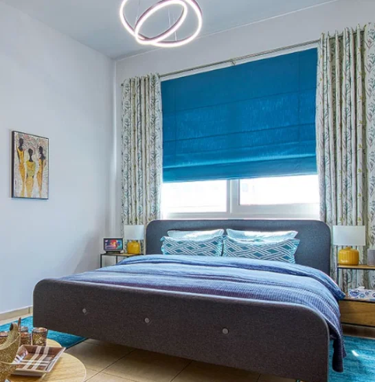 Living room vertical blinds on a large window-vivid curtains abu dhabi