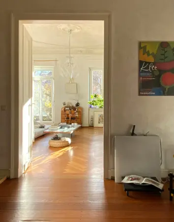 Laminate wood flooring installed in a modern Abu Dhabi living space