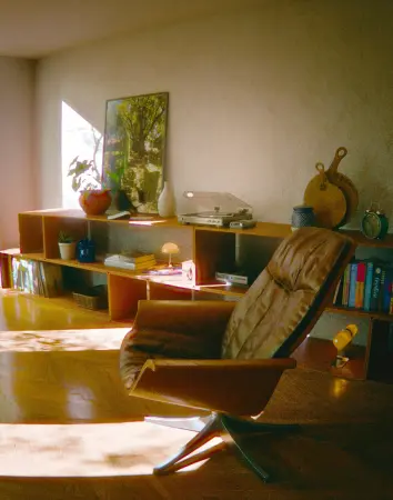 Parquet wood flooring with herringbone pattern installed in a modern Abu Dhabi interior