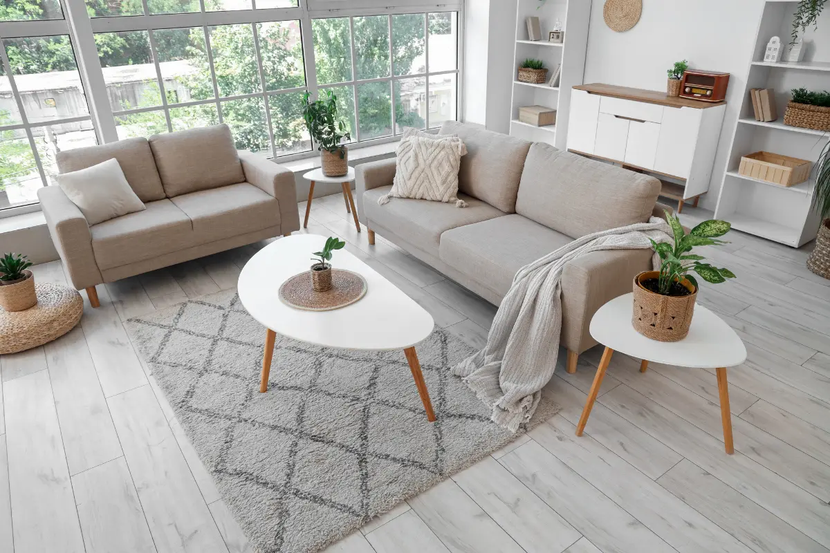 Elegant Turkish carpet with traditional patterns and rich colors placed in a modern Abu Dhabi living room interior