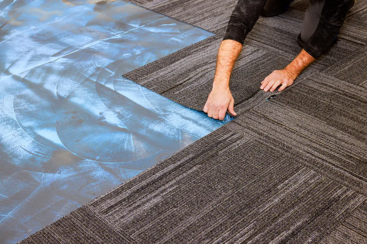 Stylish vinyl floor tiles installed in Abu Dhabi interior with modern design, durability, and easy maintenance